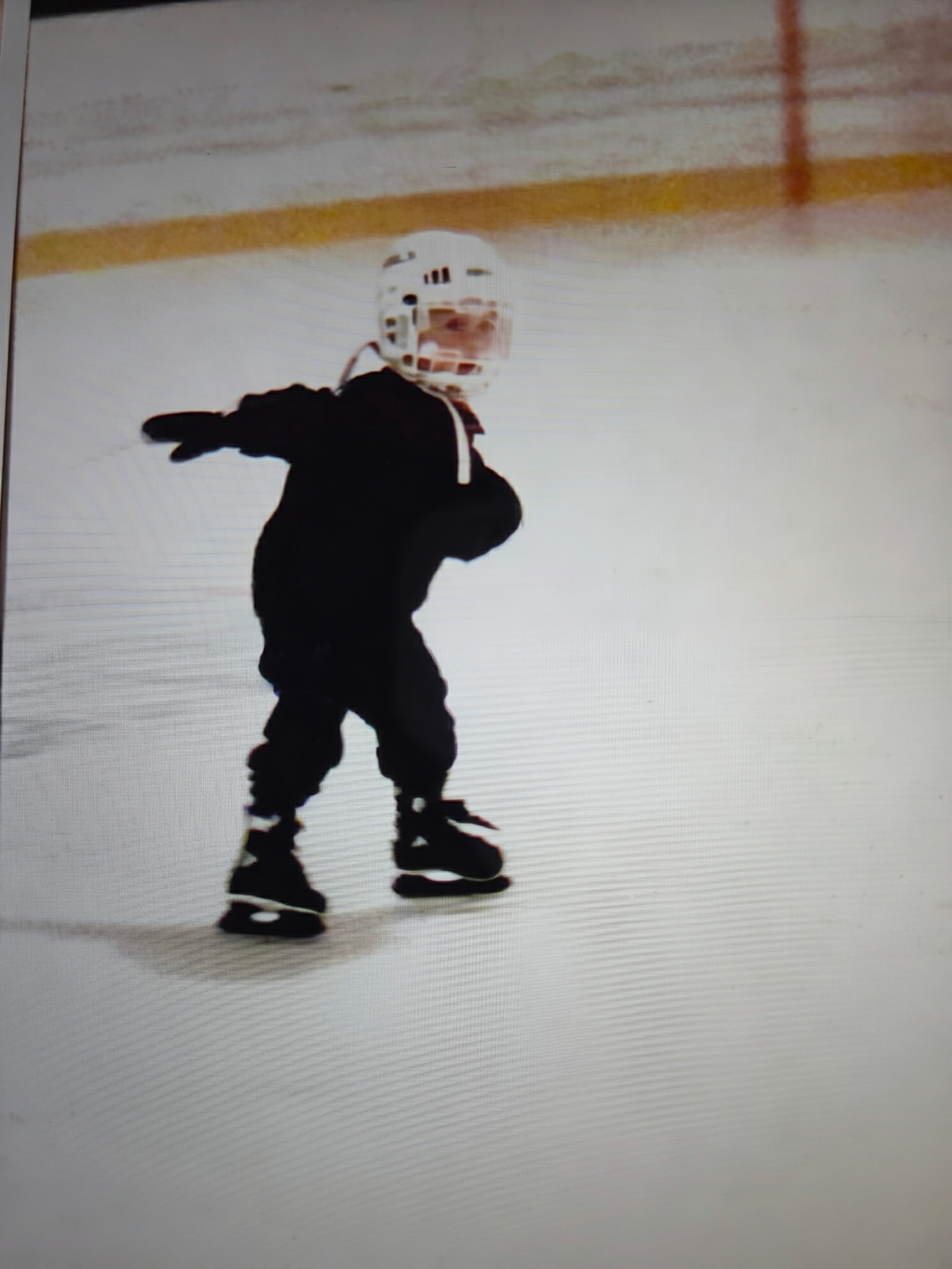 Justin skating during a youth hockey practice